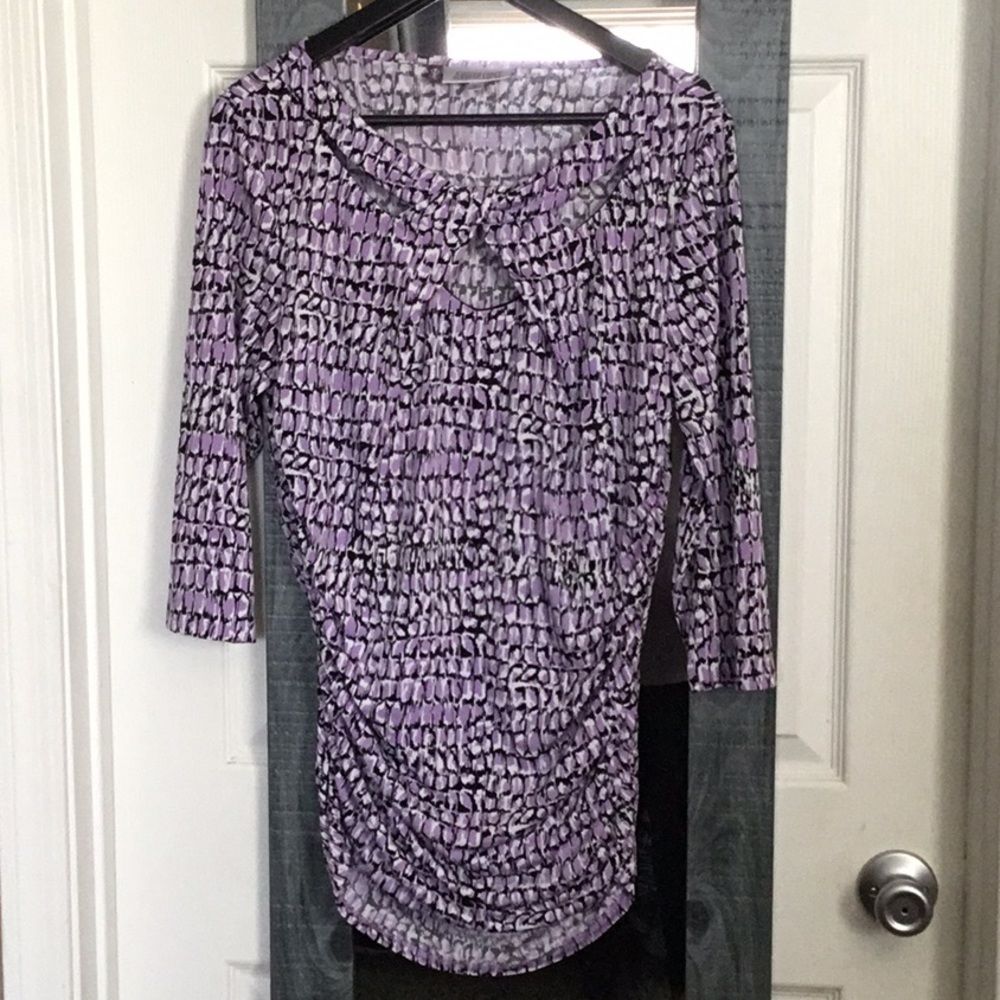 Jennifer Lopez purple black and white blouse so.L